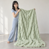 Mint Softhour Stay-In Blanket in a daylight studio