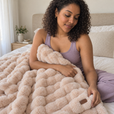 Peach Pink Softhour Stay-In Blanket in a bedroom